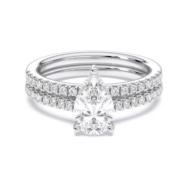 A 1.55 Carat Pear Shape Ring With Wedding Band set in White Gold, featuring a 1.00 CT Pear-shaped diamond engagement ring and a diamond-accented matching wedding band.