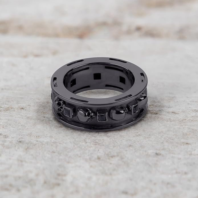 A set of Black Wedding Ring Sets His and Hers featuring a Princess Cut Black Moissanite Skull Engagement Ring and matching wedding band in 925 Sterling Silver with a Gun Metal finish.