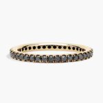 A Riviera Noir Pavé Black Diamond Black Wedding Rings For Women band (1.50mm) in 18K Yellow Gold with 0.50 CTW black diamonds.
