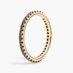 A Riviera Noir Pavé Black Diamond Black Wedding Rings For Women band (1.50mm) in 18K Yellow Gold with 0.50 CTW black diamonds.