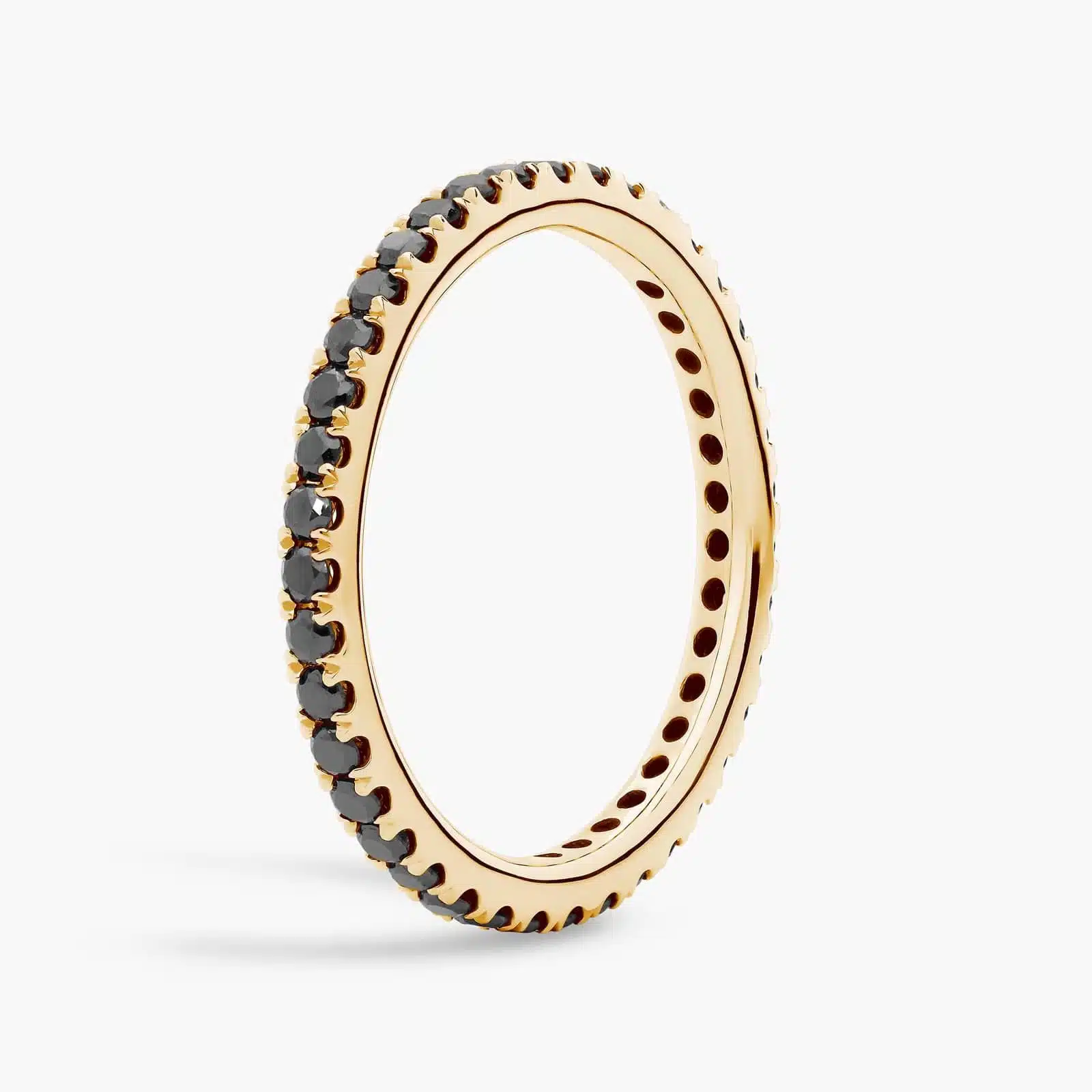 A Riviera Noir Pavé Black Diamond Black Wedding Rings For Women band (1.50mm) in 18K Yellow Gold with 0.50 CTW black diamonds.