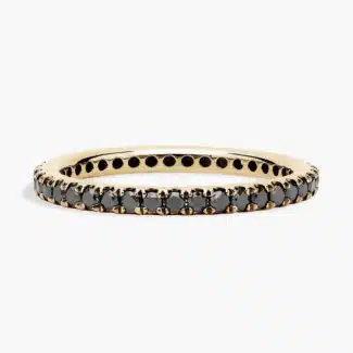 A Riviera Noir Pavé Black Diamond Black Wedding Rings For Women band (1.50mm) in 18K Yellow Gold with 0.50 CTW black diamonds.