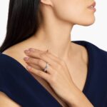 An Alternating East-West Emerald Cut Sapphire and Diamond Blue Wedding Rings For Women band (3.30mm) in 14K White Gold with over 2.5 CTW of stones.