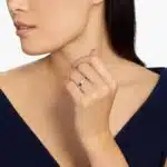 An Alternating East-West Emerald Cut Sapphire and Diamond Blue Wedding Rings For Women band (3.30mm) in 14K White Gold with over 2.5 CTW of stones.