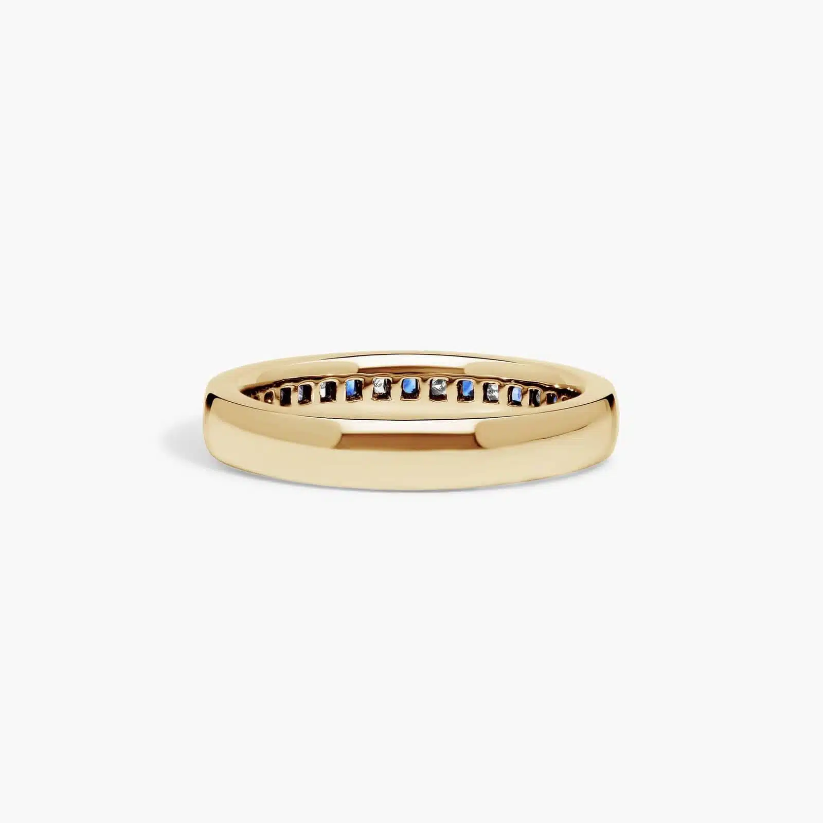 An 18K Yellow Gold Princess Cut Wedding Rings band (4.00 mm) featuring an alternating channel-set pattern of 0.5 CTW natural diamonds and blue sapphires.