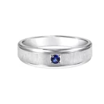 A 14K White Gold Blue Sapphire Ring for Men: 6.00 mm wide Comfort-Fit band with a brushed center finish, high-polished edges, and a striking Blue Sapphire accent.
