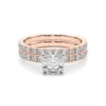 A 14K Rose Gold Cushion Cut Engagement Rings With Wedding Band set, featuring a large Cushion Cut Lab-Grown Diamond solitaire and a 0.5 ct diamond matching wedding band.