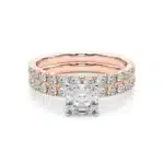 A 14K Rose Gold Cushion Cut Engagement Rings With Wedding Band set, featuring a large Cushion Cut Lab-Grown Diamond solitaire and a 0.5 ct diamond matching wedding band.