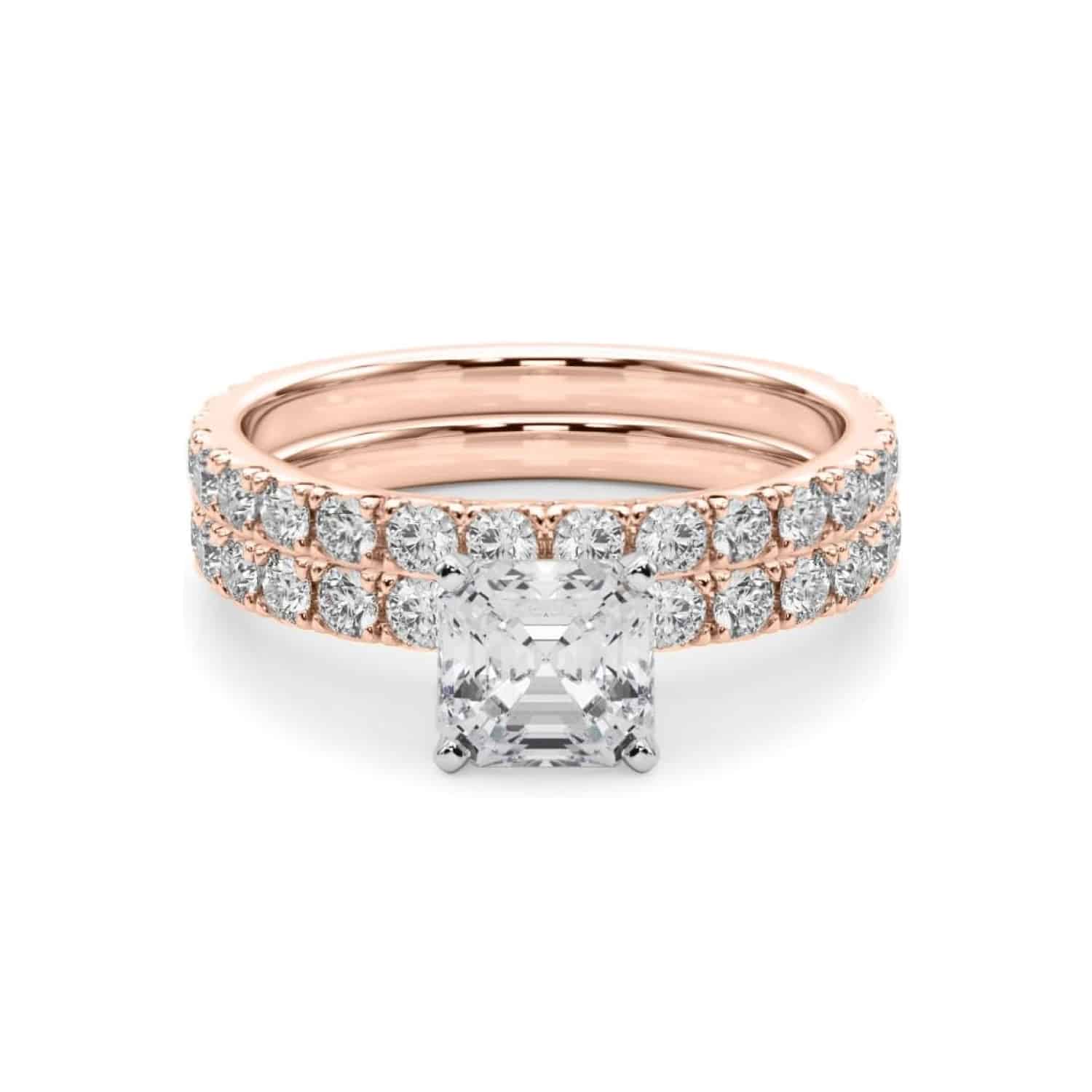 cushion-cut-lab-diamond-bridal-set-cushion-cut-engagement-rings-with-wedding-band-rose-gold-min A 14K Rose Gold Cushion Cut Engagement Rings With Wedding Band set, featuring a large Cushion Cut Lab-Grown Diamond solitaire and a 0.5 ct diamond matching wedding band.
