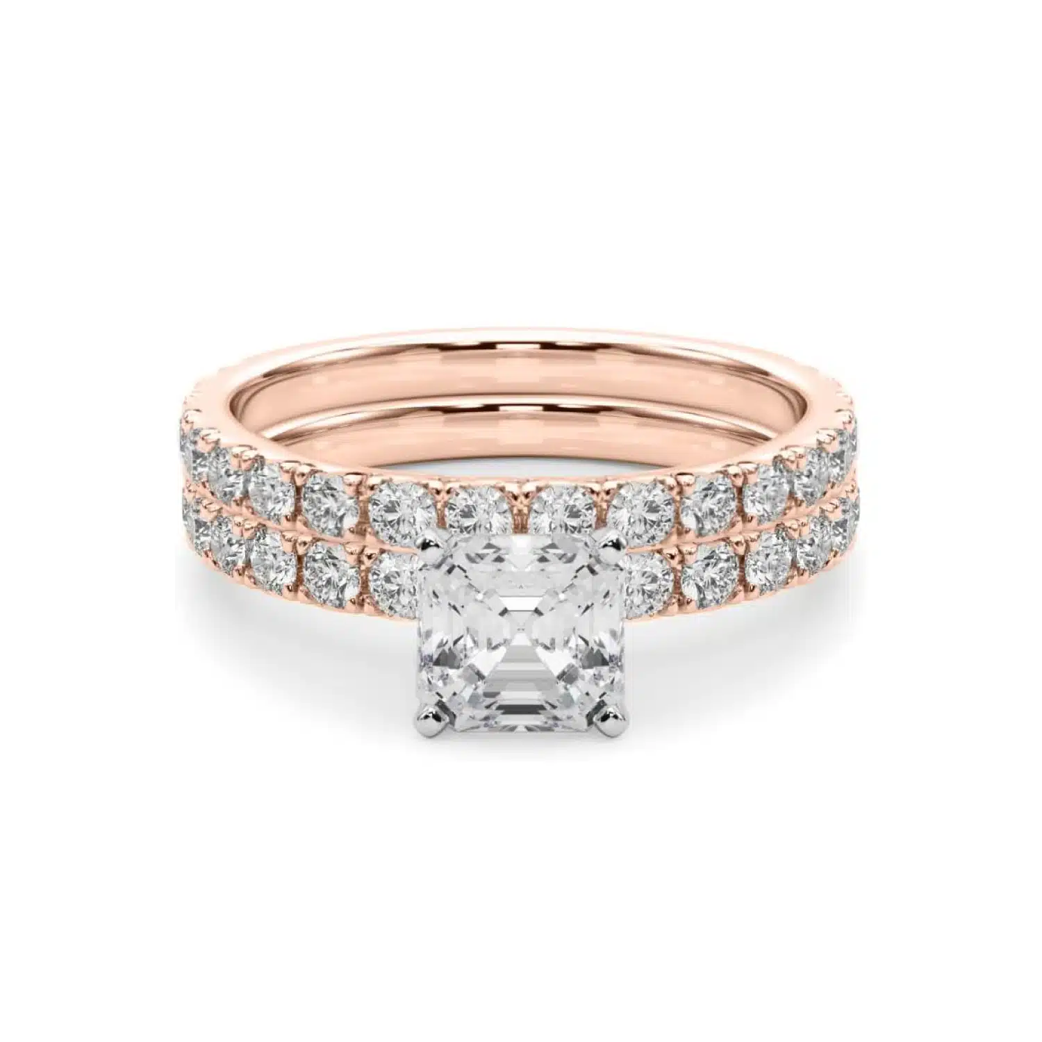 A 14K Rose Gold Cushion Cut Engagement Rings With Wedding Band set, featuring a large Cushion Cut Lab-Grown Diamond solitaire and a 0.5 ct diamond matching wedding band.