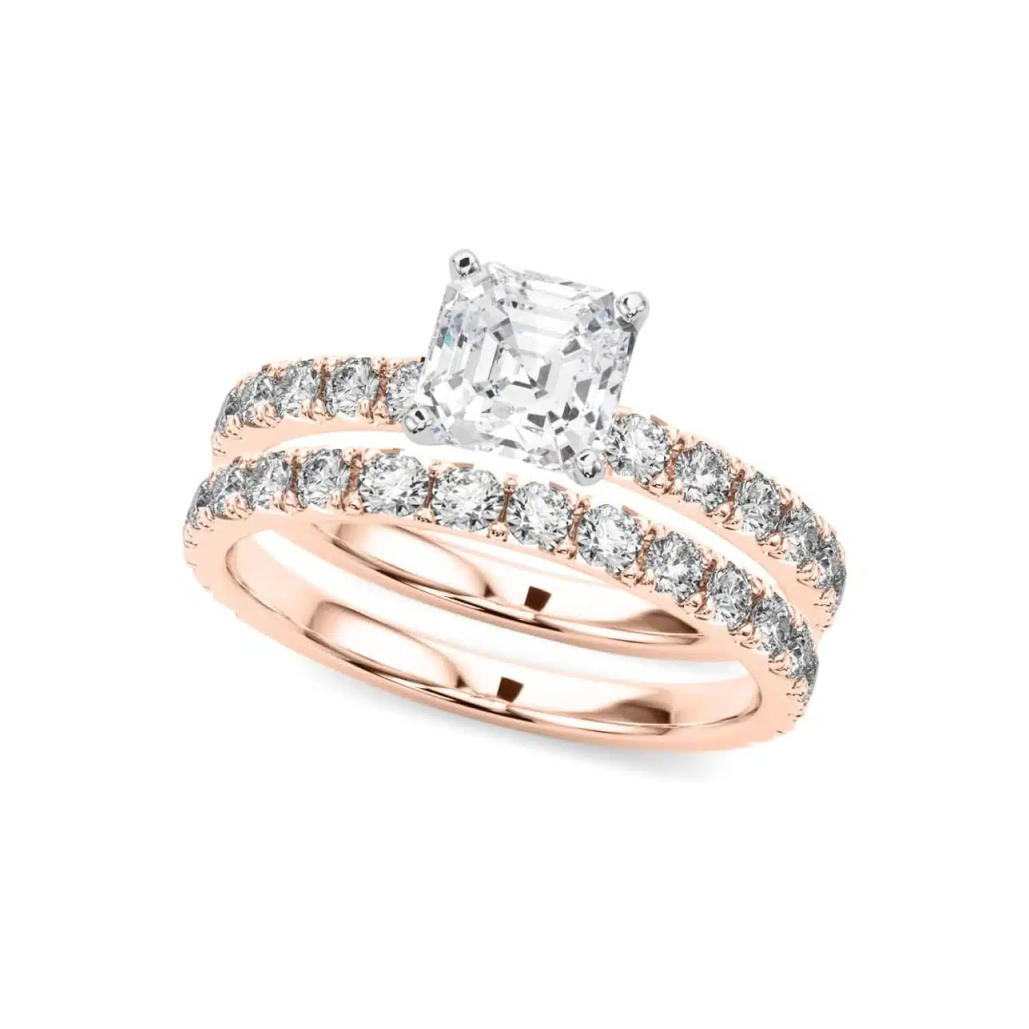 A 14K Rose Gold Cushion Cut Engagement Rings With Wedding Band set, featuring a large Cushion Cut Lab-Grown Diamond solitaire and a 0.5 ct diamond matching wedding band.
