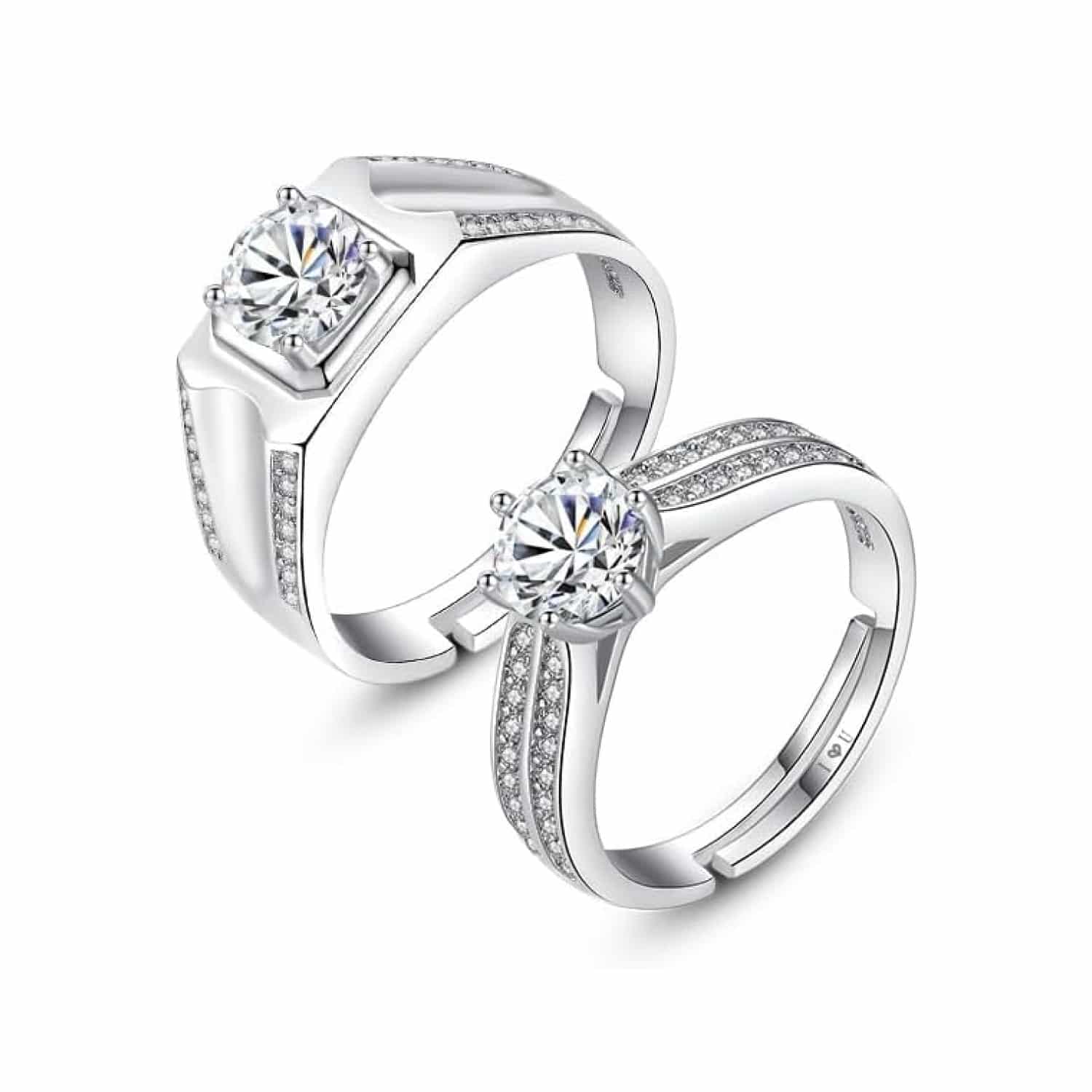 A set of Unique Matching Wedding Bands His and Hers in 0.925 Sterling Silver, featuring Round Natural Diamonds with D Color and VVS1 Clarity in a 1.0 Carat solitaire style.