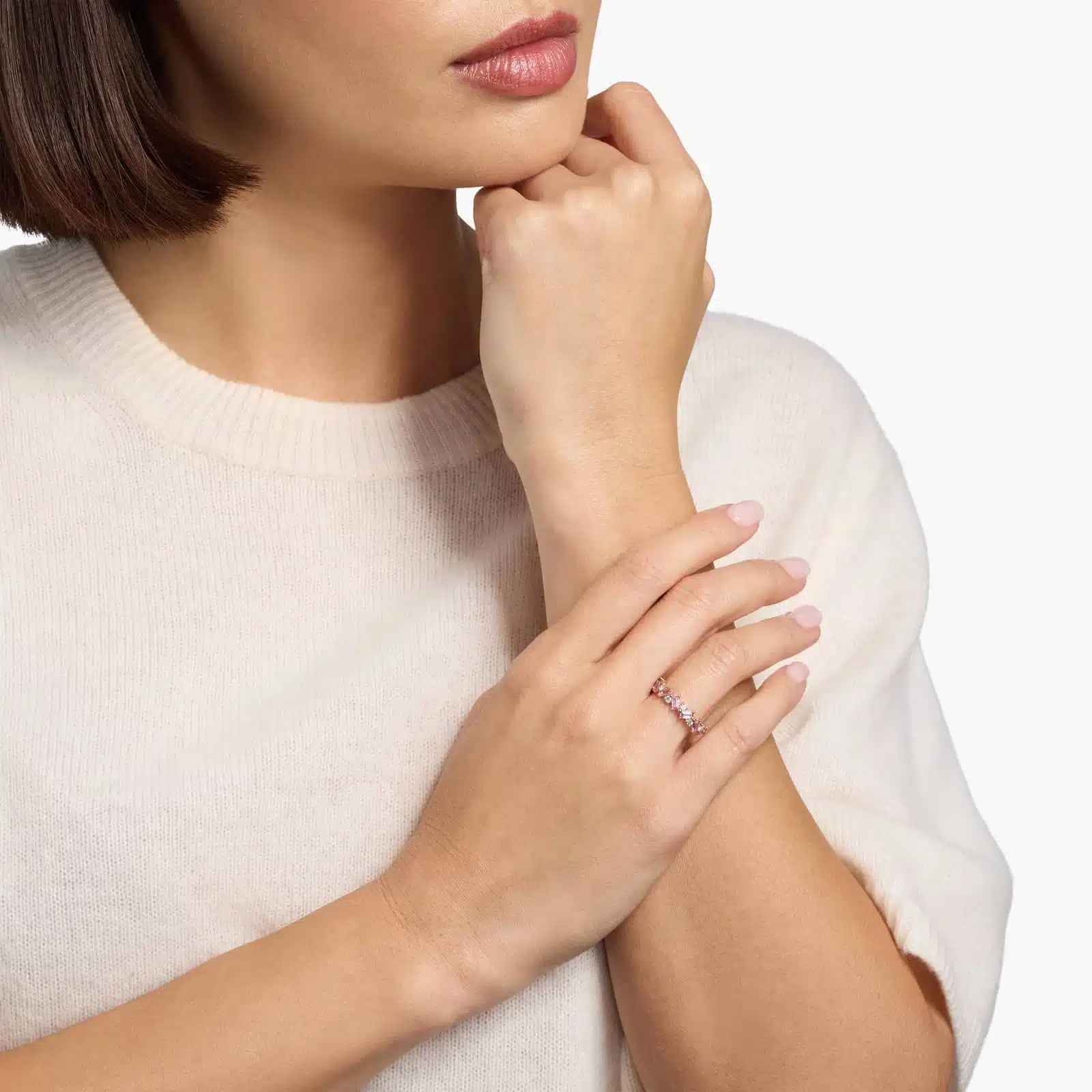 A 14K Rose Gold and Pink Sapphire Ring featuring 7 Baguette Pink Sapphires and 6 Round Diamonds (0.18 CTW) set in prongs, creating a romantic, emerald-style look on a 2.50 mm band.