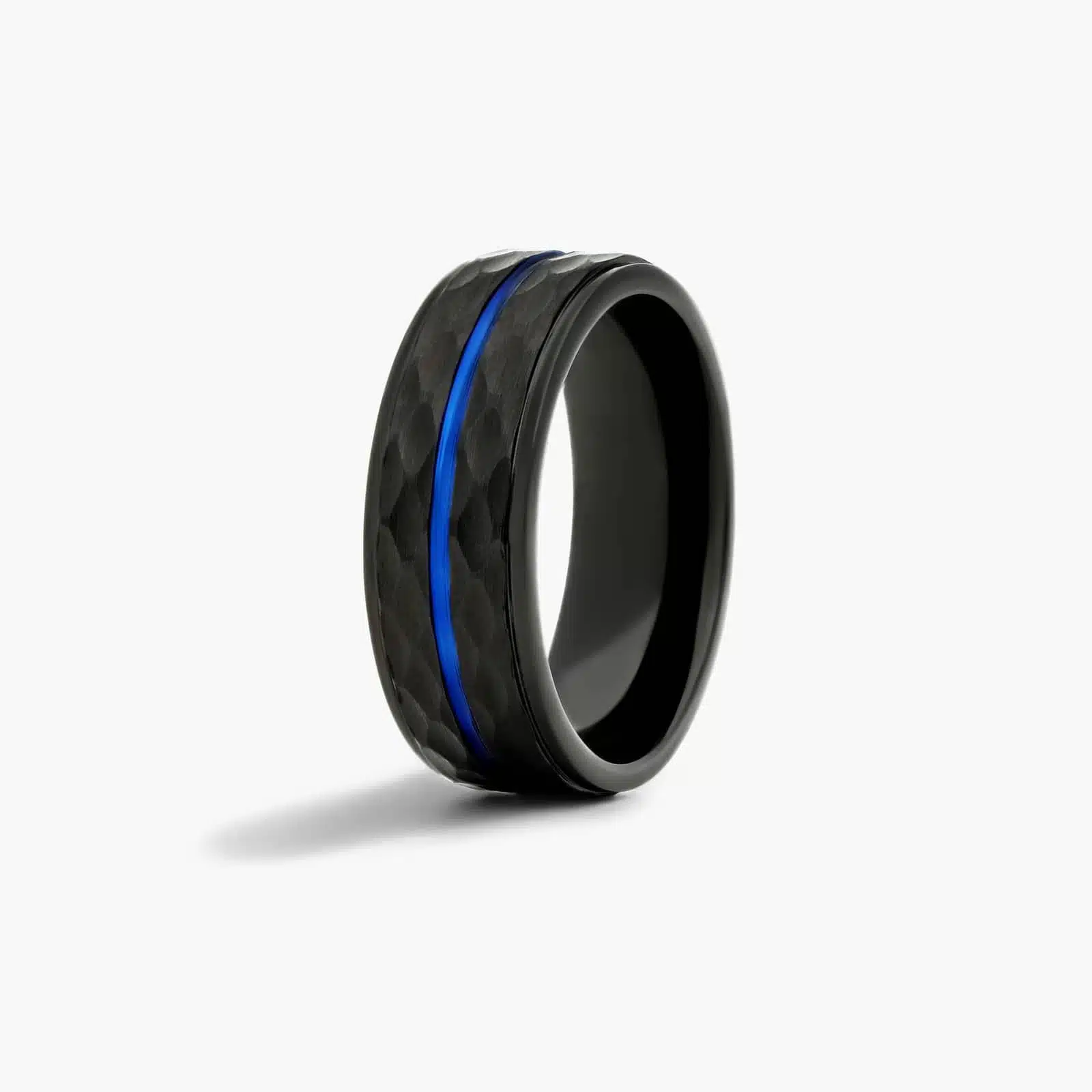 An 8.00mm wide Black and Blue Mens Wedding Ring made of Cobalt metal with a faceted exterior and a central blue stripe inlay.