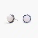 A pair of 14K White Gold Pearl and Sapphire Drop Earrings (Halo Stud style) featuring 7 mm Freshwater Cultured Pearls surrounded by a halo of 32 Round Blue Sapphires, secured with Push Backs.