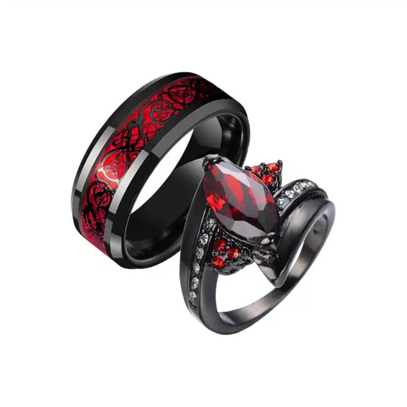 A set of His and Hers Black Wedding Ring Sets: Her ring features a red Synthetic Ruby Marquise center stone on a black V-shaped band, and his ring is a black band with a red Celtic Knot inlay.