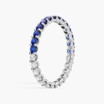 A Half and Half Sapphire and Diamond Eternity Sapphire Wedding Rings For Women band (2.00mm) in 14K White Gold with 0.52 CTW sapphires and 0.48 CTW diamonds.