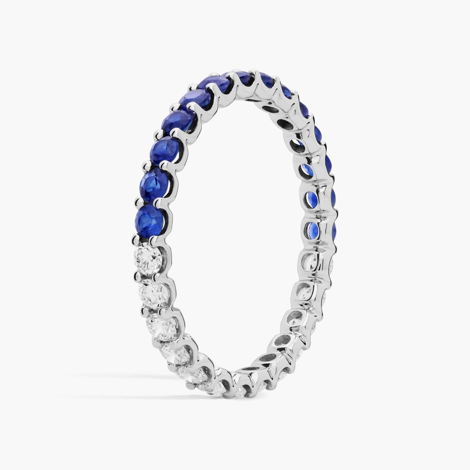 A Half and Half Sapphire and Diamond Eternity Sapphire Wedding Rings For Women band (2.00mm) in 14K White Gold with 0.52 CTW sapphires and 0.48 CTW diamonds.