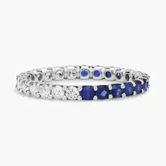 A Half and Half Sapphire and Diamond Eternity Sapphire Wedding Rings For Women band (2.00mm) in 14K White Gold with 0.52 CTW sapphires and 0.48 CTW diamonds.