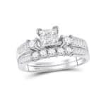 A 10K White Gold Baguette Wedding Band With Engagement Ring two-piece set featuring an invisible-set Princess Cut center and channel-set Baguette and Round diamonds (0.90 CTW).