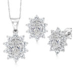 A 10K White Gold White Sapphire Earrings and Pendant Jewelry Set with 2.70 CTW total of Oval Lab Grown Diamonds (DEF/VVS-VS) and Round White Created Sapphires. Earrings have friction backs.