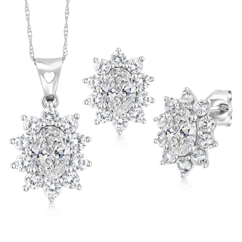A 10K White Gold White Sapphire Earrings and Pendant Jewelry Set with 2.70 CTW total of Oval Lab Grown Diamonds (DEF/VVS-VS) and Round White Created Sapphires. Earrings have friction backs.