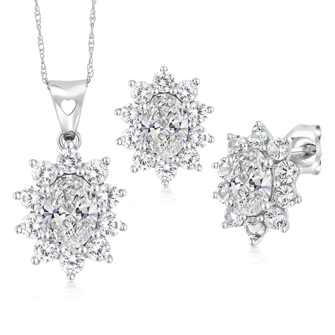 A 10K White Gold White Sapphire Earrings and Pendant Jewelry Set with 2.70 CTW total of Oval Lab Grown Diamonds (DEF/VVS-VS) and Round White Created Sapphires. Earrings have friction backs.