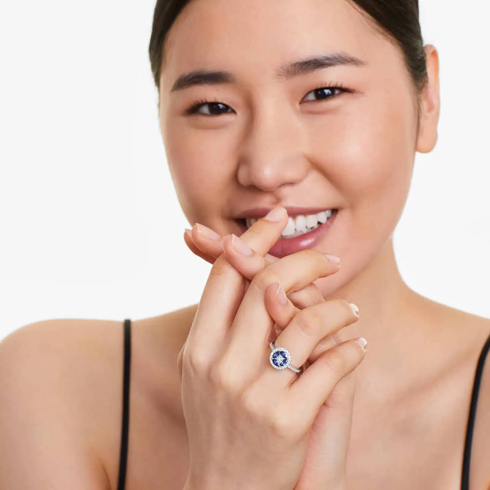 A 14K White Gold Princess Cut Diamond Ring with Sapphires, featuring four Marquise Blue Sapphires (0.62 CT min) set as flower petals, accented by a 0.18 CT Princess Cut Diamond and 0.28 CTW Round Diamonds.