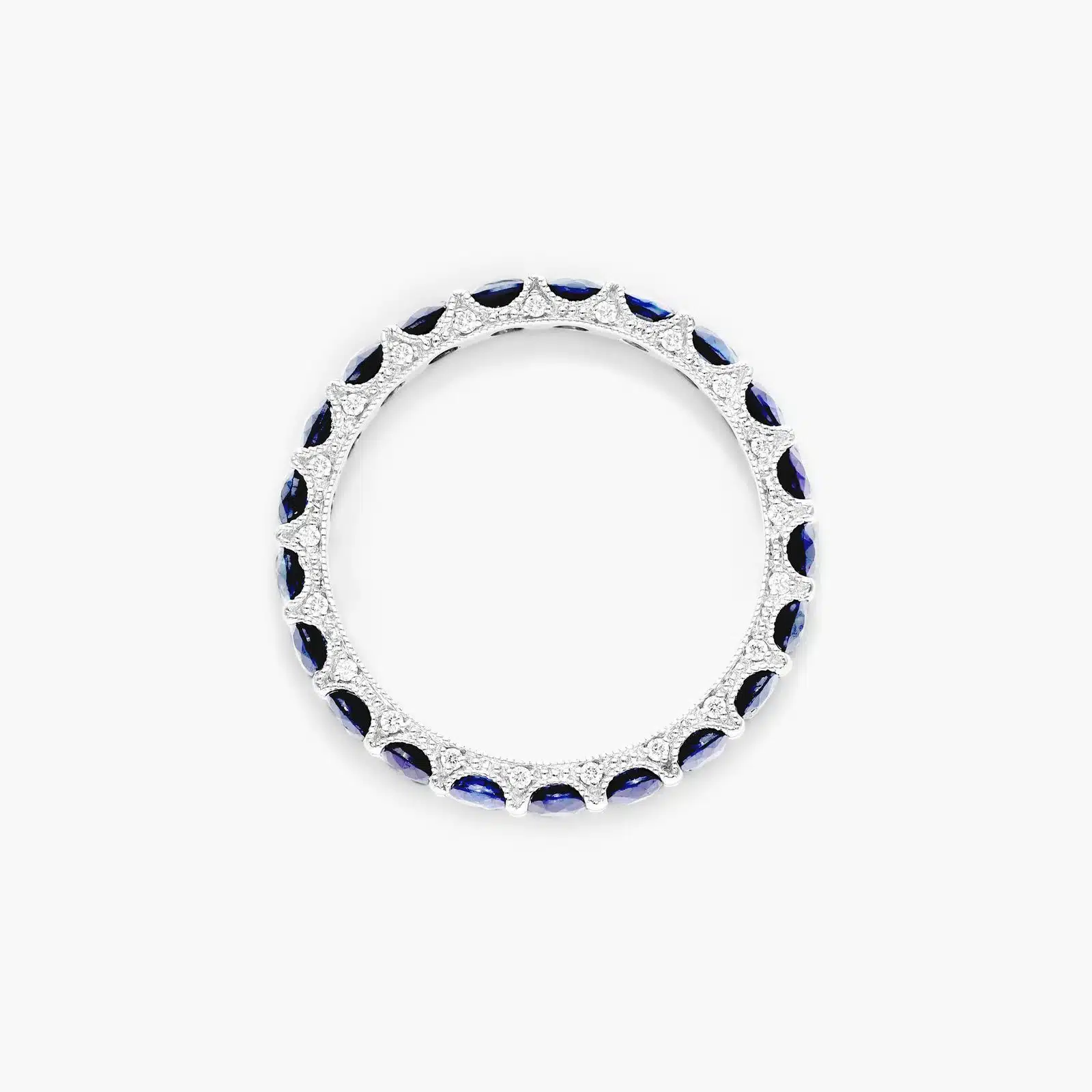milgrain-eternity-blue-sapphire-diamond-wedding-ring-sets-14k-white-gold 2 A 14K White Gold Blue Sapphire and Diamond Wedding Ring Sets component: a 3.00 mm Milgrain Embellished Eternity Band with 2.25 Carat minimum Round Blue Sapphires and 0.11 CTW diamond accents.