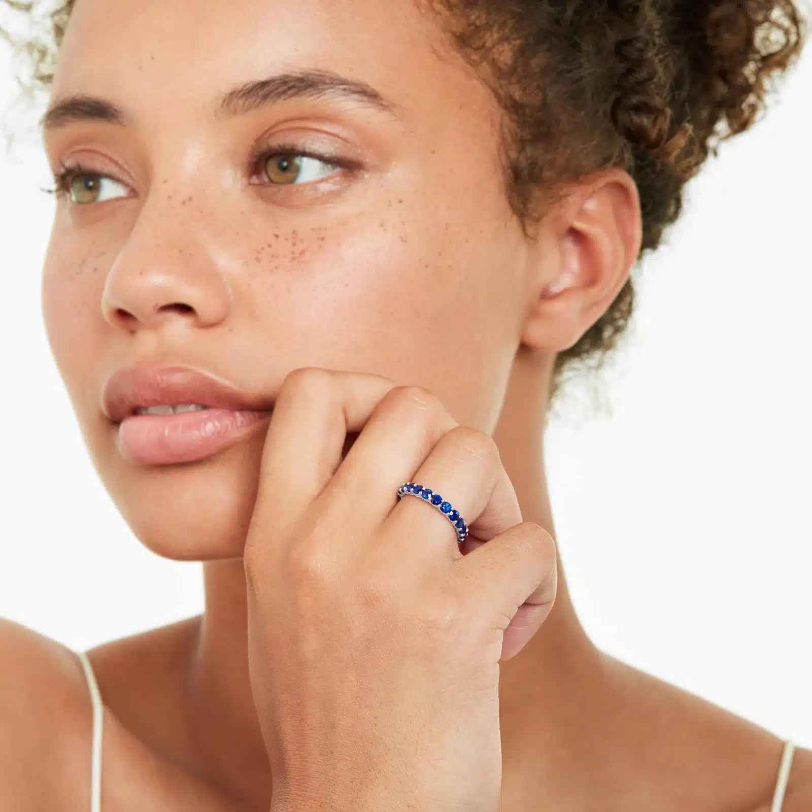 milgrain-eternity-blue-sapphire-diamond-wedding-ring-sets-14k-white-gold model view A 14K White Gold Blue Sapphire and Diamond Wedding Ring Sets component: a 3.00 mm Milgrain Embellished Eternity Band with 2.25 Carat minimum Round Blue Sapphires and 0.11 CTW diamond accents.