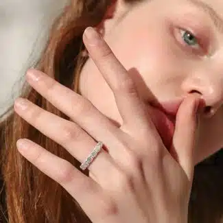 A 925 Sterling Silver Wedding Rings For Women band featuring 5.1 cttw D Color VVS1 Round Moissanite in an Eternity setting.