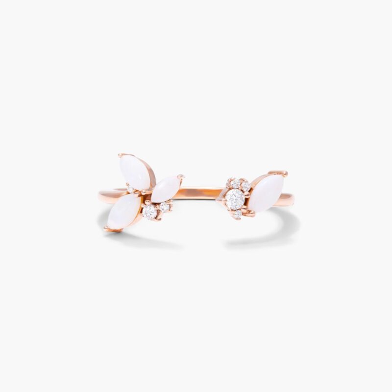 A 14K Rose Gold Open Ring Opal Wedding Rings For Women with asymmetrically set Marquise Cabochon Opals (0.46 CTW min) and Round Diamond accents.