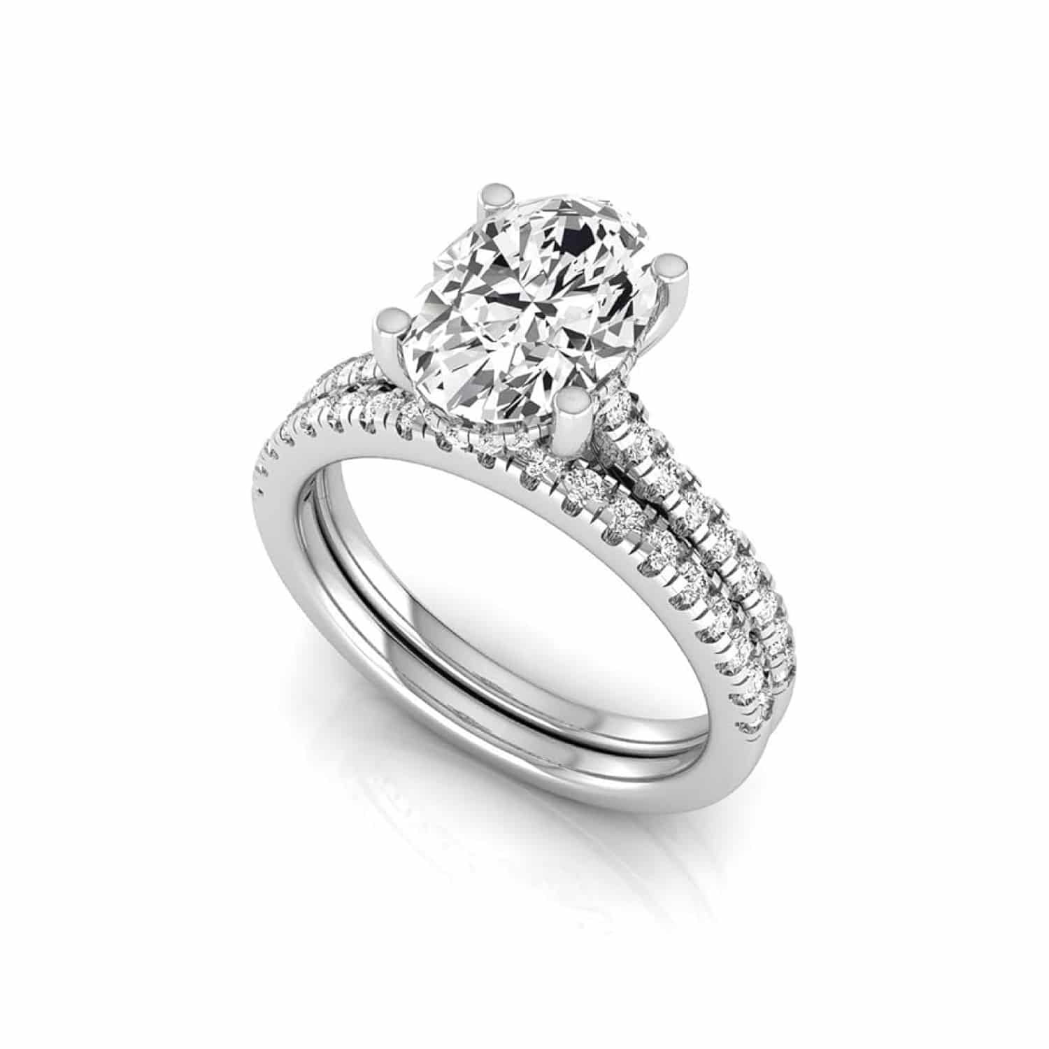 An IGI Certified Stacked Wedding Bands With Engagement Ring set in 14K White Gold featuring a 2.00 CT Oval Lab-Grown Diamond and a 0.50 CTW stackable wedding band.