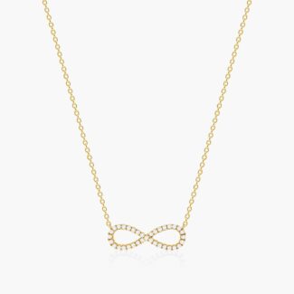 14K yellow gold infinity necklaces valentine's day jewelry for her featuring a diamond pavé infinity symbol on a 16-inch cable chain.