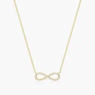 14K yellow gold infinity necklaces valentine's day jewelry for her featuring a diamond pavé infinity symbol on a 16-inch cable chain.