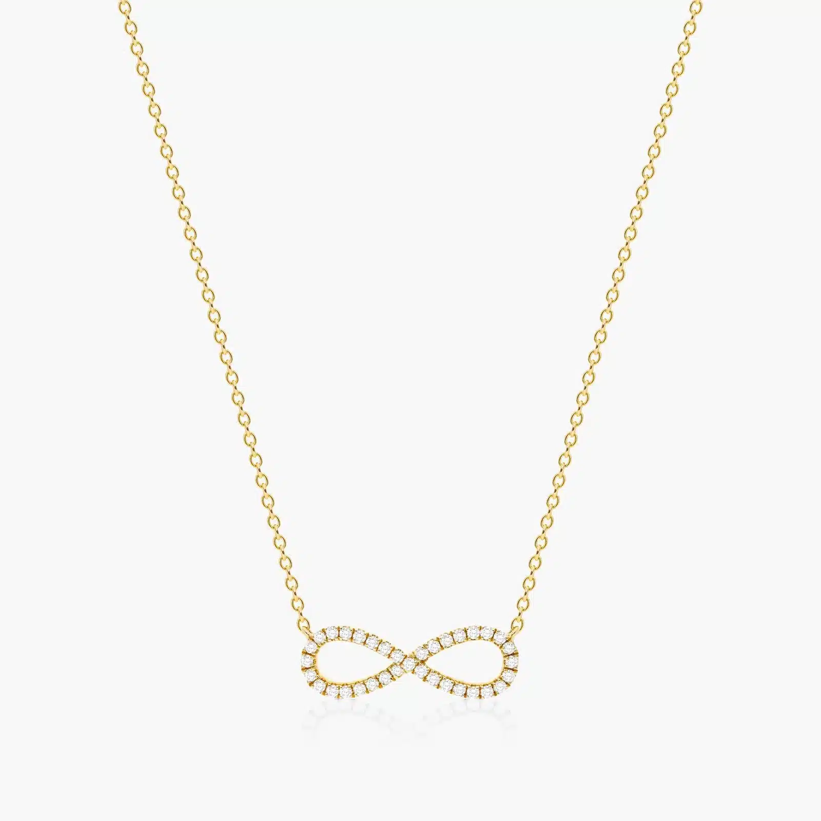 14K yellow gold infinity necklaces valentine's day jewelry for her featuring a diamond pavé infinity symbol on a 16-inch cable chain.