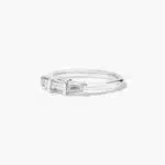 A 2.00 mm Platinum Tapered Baguette Wedding Band featuring three Natural Tapered Baguette Diamonds totaling 0.33 CTW.