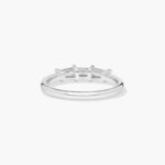 A 2.00 mm Platinum Tapered Baguette Wedding Band featuring three Natural Tapered Baguette Diamonds totaling 0.33 CTW.