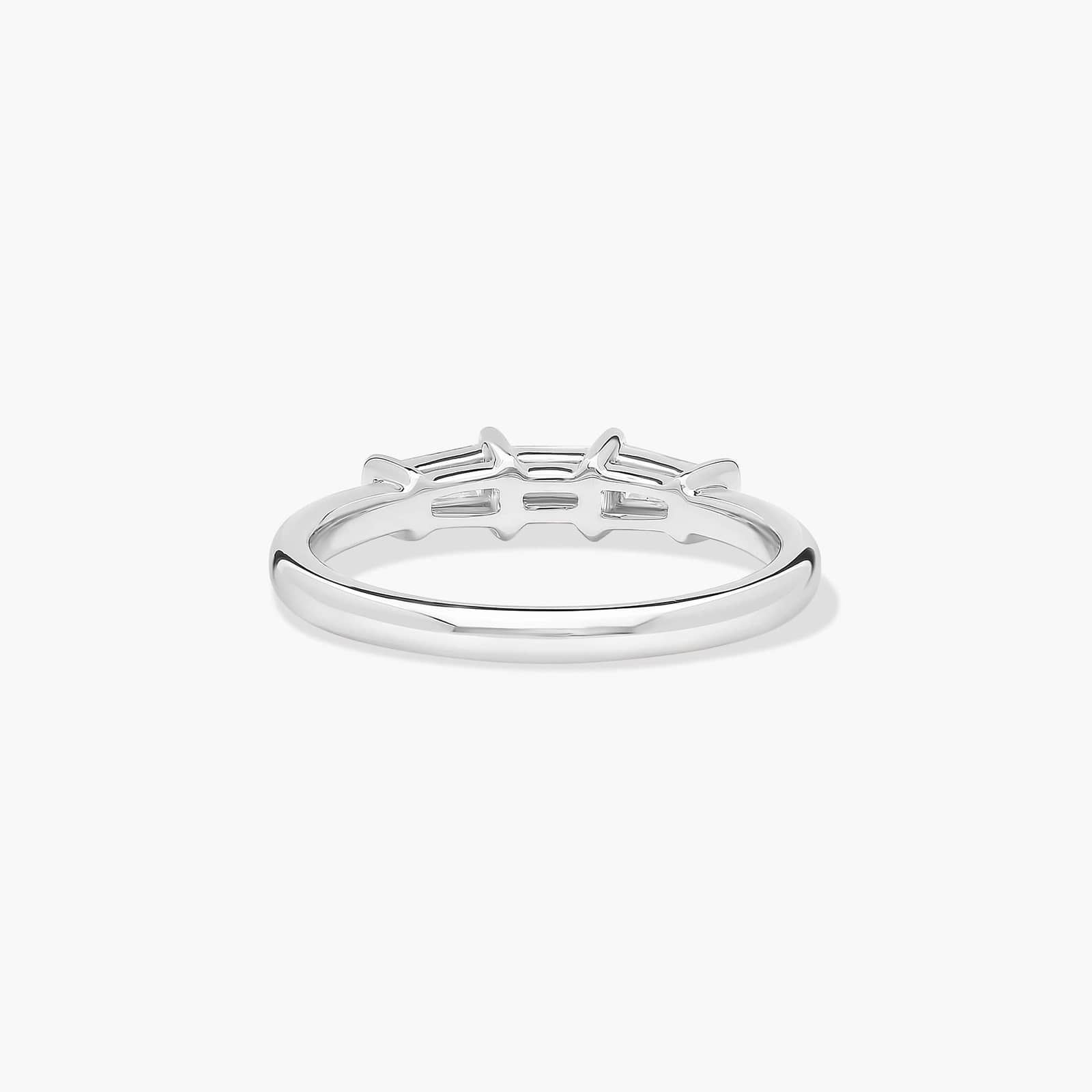 platinum-diamond-tapered-baguette-wedding-band-0-33ctw 3 A 2.00 mm Platinum Tapered Baguette Wedding Band featuring three Natural Tapered Baguette Diamonds totaling 0.33 CTW.