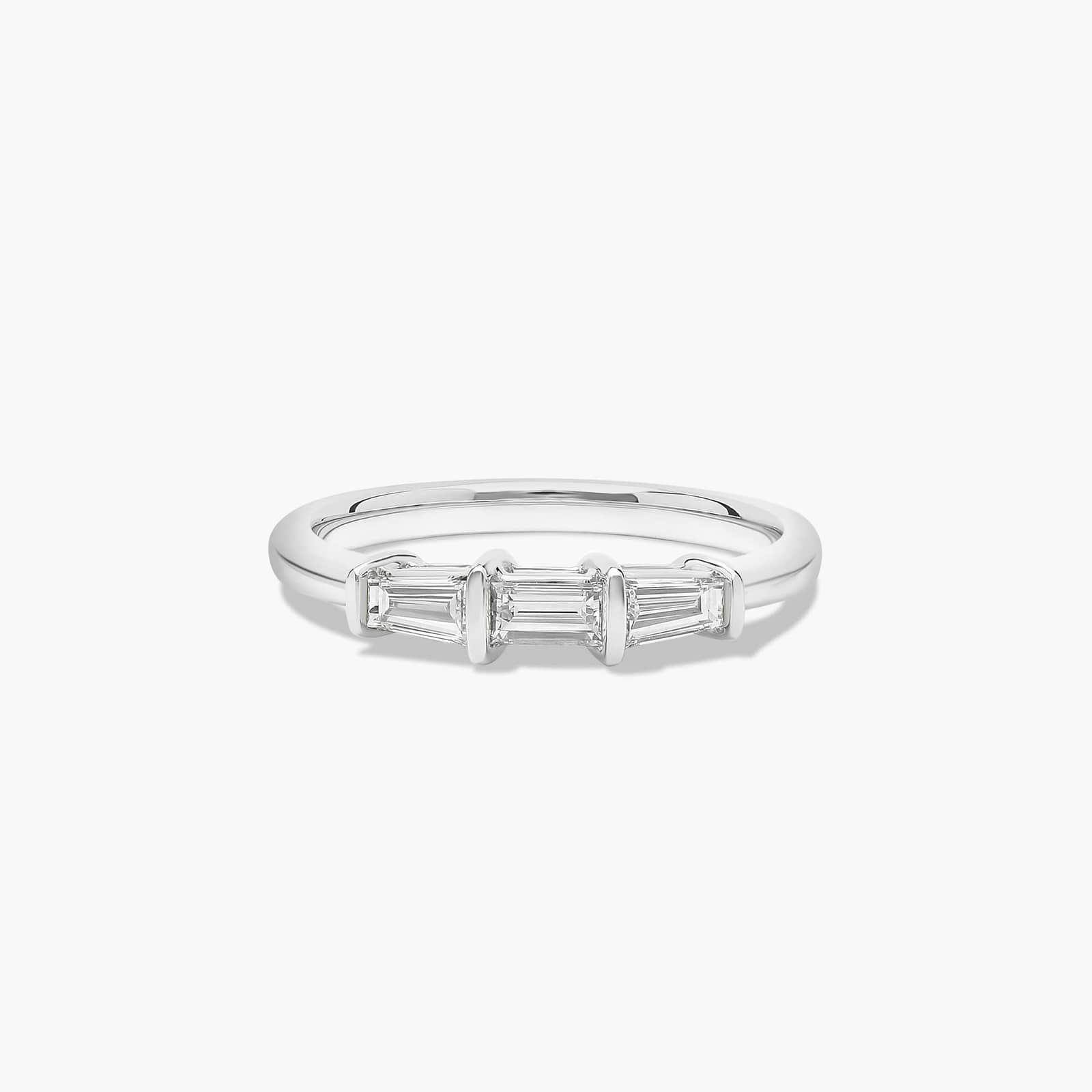 platinum-diamond-tapered-baguette-wedding-band-0-33ctw A 2.00 mm Platinum Tapered Baguette Wedding Band featuring three Natural Tapered Baguette Diamonds totaling 0.33 CTW.