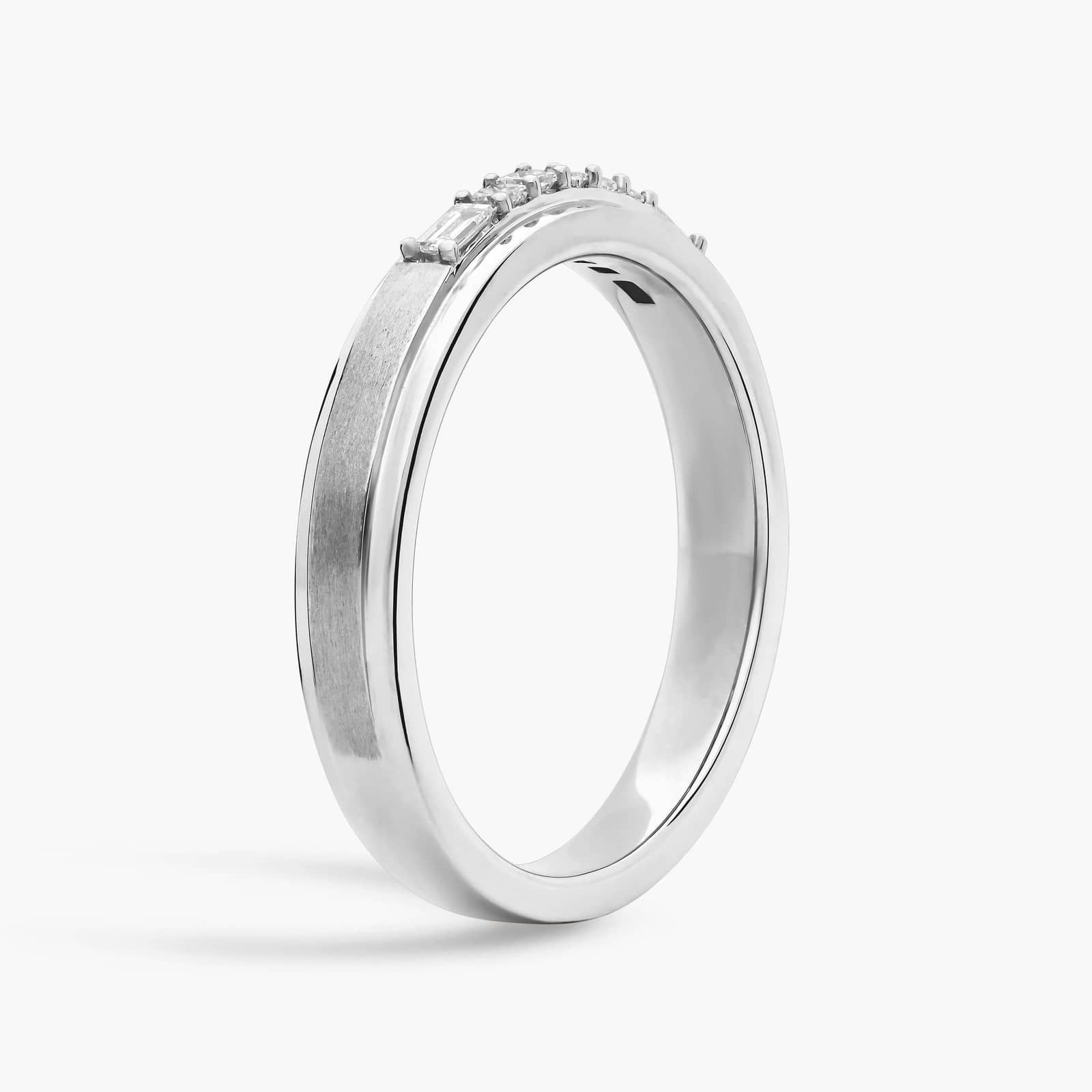A 3.60 mm wide Platinum Mens Wedding Bands With Baguettes featuring an alternating pattern of Baguette and Princess Cut natural diamonds (1/5 CTW).