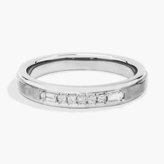 A 3.60 mm wide Platinum Mens Wedding Bands With Baguettes featuring an alternating pattern of Baguette and Princess Cut natural diamonds (1/5 CTW).