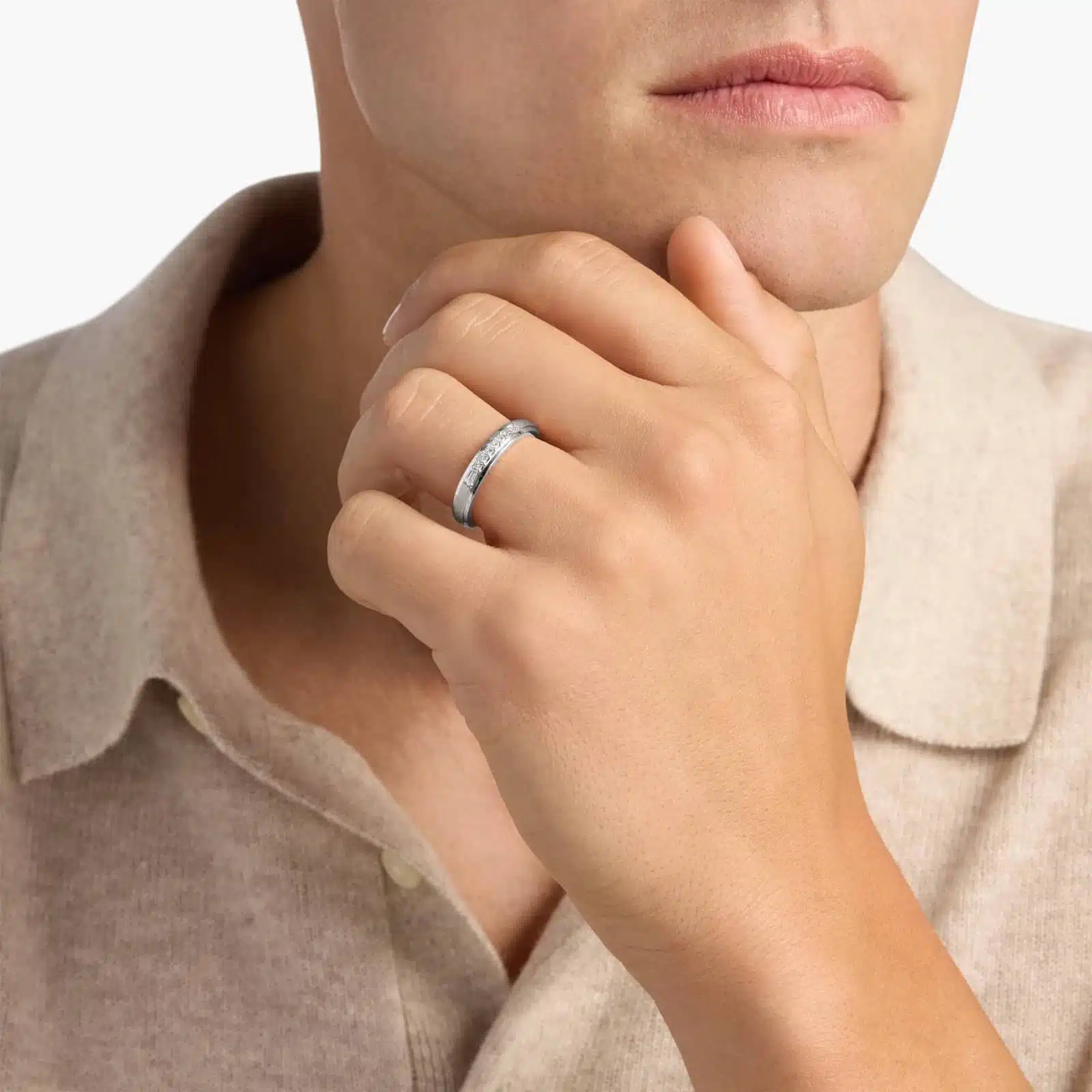 A 3.60 mm wide Platinum Mens Wedding Bands With Baguettes featuring an alternating pattern of Baguette and Princess Cut natural diamonds (1/5 CTW).