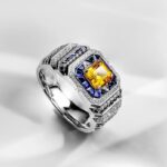 A 0.925 Sterling Silver Yellow Sapphire Ring for Men: a 1 Carat Rectangular Created Yellow Sapphire set in a Halo style, with an Eye Clean clarity grade.