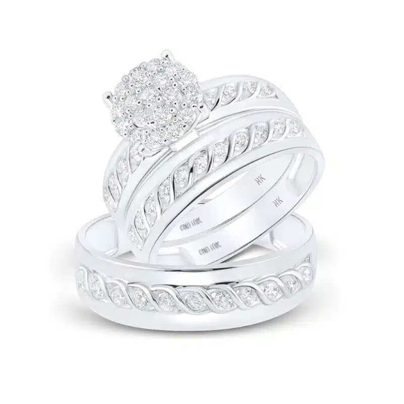 A 10K White Gold His and Hers Engagement Rings Sets featuring a Round Diamond Cluster engagement ring and coordinating matching bands, totaling 3/4 Carat Total Weight.