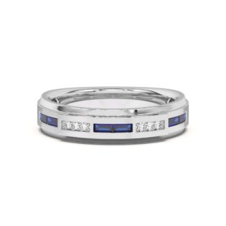 An 18K White Gold Women's Baguette Wedding Band featuring an alternating channel-set pattern of Baguette Blue Sapphires and Round Diamonds (0.06 CTW). The band tapers in width.