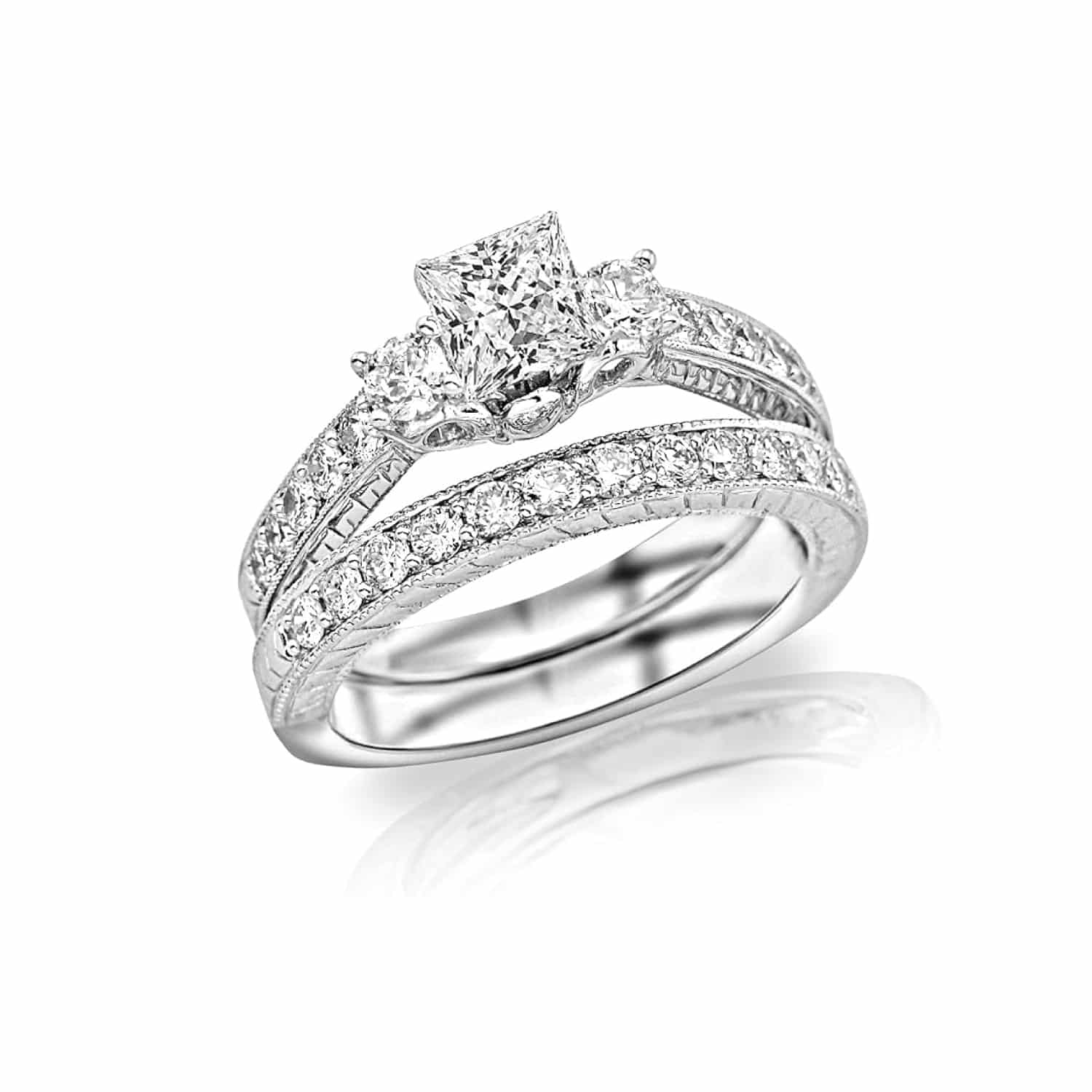 A White Gold 3 Stone Princess Cut Engagement Ring With Wedding Band set, featuring vintage Milgrain and Filigree detailing and 1.48 Carat Total Weight of Princess Cut diamonds.