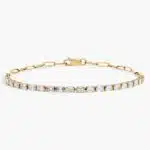 14K yellow gold emerald cut lab grown diamond tennis bracelets under $3000 featuring 2 CTW bezel-set diamonds and a paperclip chain.