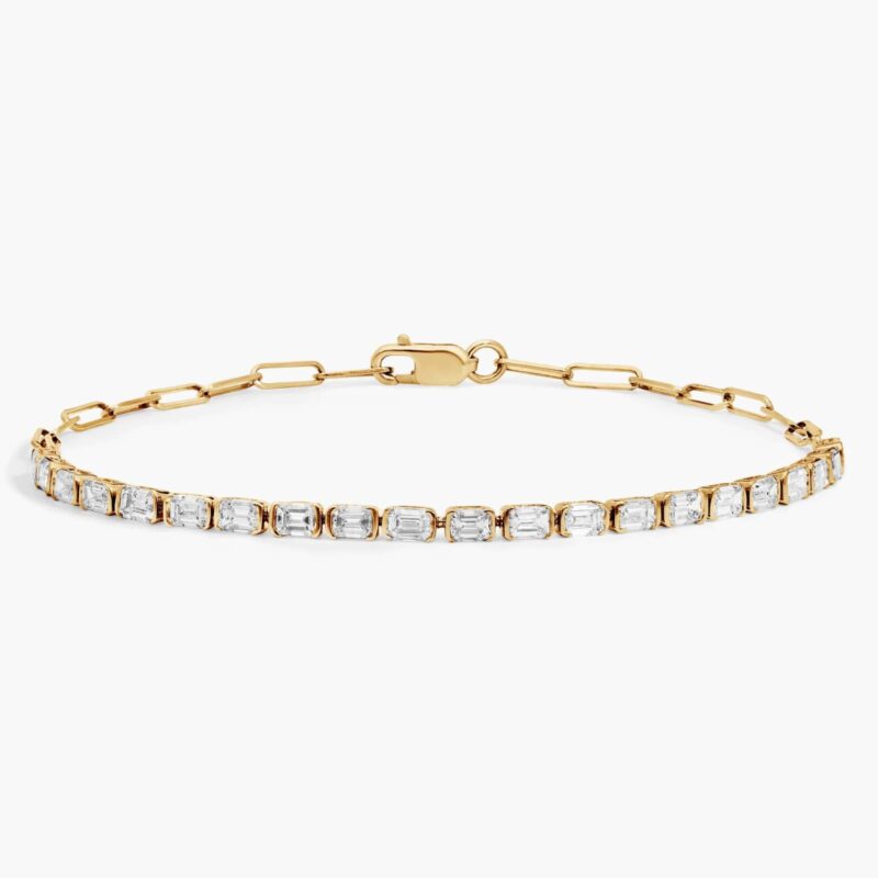 14K yellow gold emerald cut lab grown diamond tennis bracelets under $3000 featuring 2 CTW bezel-set diamonds and a paperclip chain.