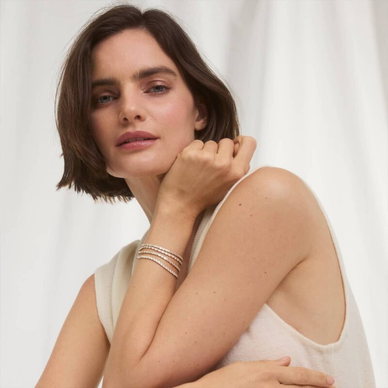 14K yellow gold emerald cut lab grown diamond tennis bracelets under $3000 featuring 2 CTW bezel-set diamonds and a paperclip chain.